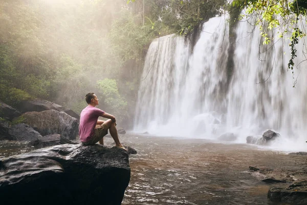 Man Sitting Rock Front High Waterfall Mountains Tropical Landscape Camobodia — Stock Photo, Image