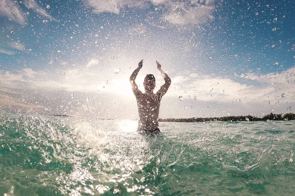 Silhouette Joyful Man Standing Sea Splashing Water Camera Sunny Day — Stock Photo, Image