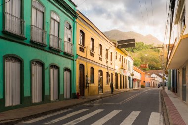 Santa Leopoldina, ES, Brazil - August 13, 2022: Empty main street of small colonial town in Espirito Santo state which was founded by Swiss immigrants. clipart