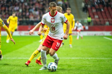WARsaw, POLAND - 21 Mart 2025 FIFA Dünya Şampiyonası elemeleri 2026. Polonya - Litvanya 1: 0. Eylemde Przemyslaw Frankowski.