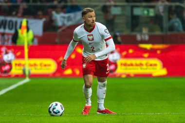 WARsaw, POLAND - 21 Mart 2025 FIFA Dünya Şampiyonası elemeleri 2026. Polonya - Litvanya 1: 0. Hareket halindeki Matty Cash.