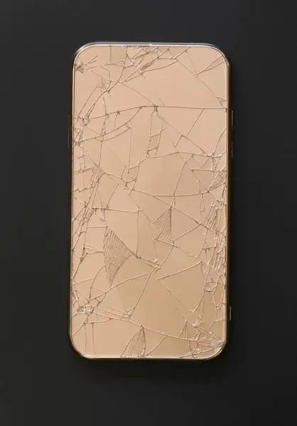 Broken mobile phone cases on black background.