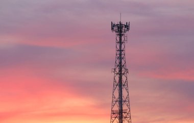 Telephone tower on evening cloud and twilight sky background, Have copy space for design in your work.