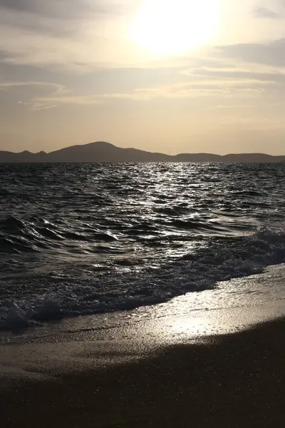 stock image Black sea view with sunset and sky twilight, View of the tropical coast of Thailand with islands in front in the evening.