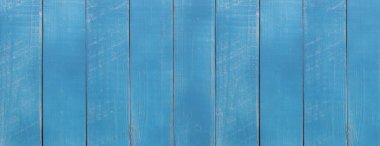 Sersemletici mavi ahşap bir doku, sanat, tasarım ve zanaat projelerinde arka plan için ideal taze ve canlı bir his sunuyor, biraz sükunet katıyor..