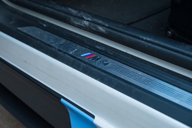 Slovenia, Ljubljana - 31 January 2023: BMW M4 high performance car detail with logo