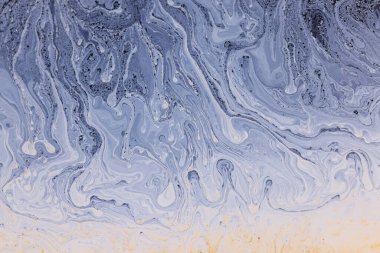 Sıvı sabun köpüğü psikedelik renkli soyut sanat. Gökkuşağı ve hareket halindeki renk dalgalarıyla gerçeküstü desenler.