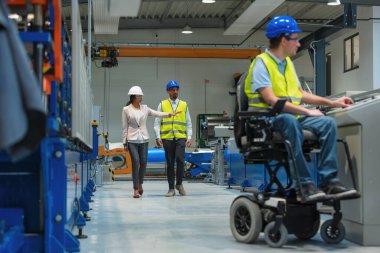 Factory woman CEO touring with an employee the production line, where another worker with a disability expertly completing his tasks. clipart