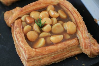 Danish dessert pastries with macadamia and custard cream. Fresh Bakery for morning  for breakfast.