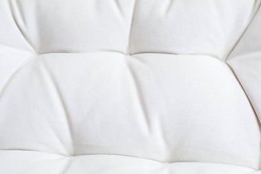 Beyaz şilte kanepe desenini kapat. Tasarım sanatı için zemin. Mobilyalı duvar kâğıdı.