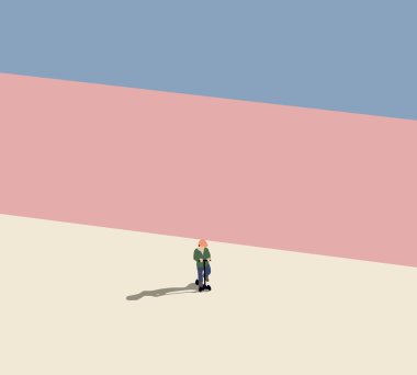 Kid boy ride scooter in park outdoors on summer day. Children fun in the summer. Active leisure and outdoor sport