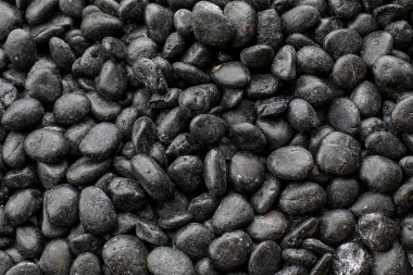 Bahçe yolu için siyah çakıl taşı zemini. Yüzey dokusu. Pankart için arkaplan, arkaplan duvar kağıdı.