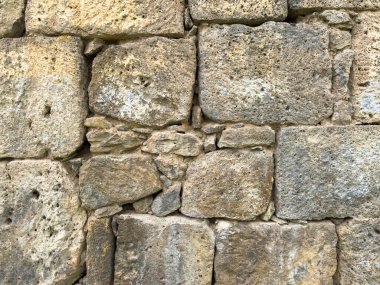 Doku, arka plan, kusursuz desen. Bu tasarımcılar için yararlı. Taş duvar. İstek sürecini erteleyin ya da binanın dikey bir bölümünü engelleyin. Yüksek kalite fotoğraf