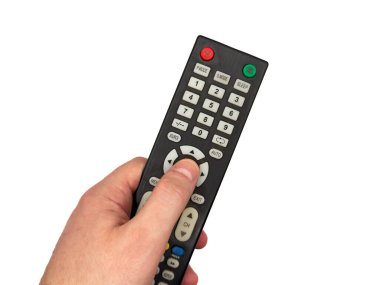 Beyaz erkek eli beyaz arka planda TV uzaktan kumandasında tuşlara basıyor, adam uzaktan kumandayla TV kanallarını değiştiriyor, pankartlar için, TV reklamları için. Uzayı kopyala, deri döşeme, üst görünüm. Yüksek kalite fotoğraf