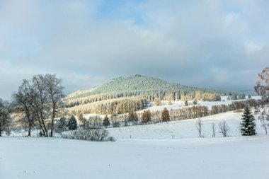 Beautiful winter landscape on the heights of the Thuringian Forest near Oberhof - Thuringia - Germany clipart