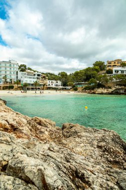 Short but beautiful hike to the Es Ponts rock gate and the coastal town of Santany in the south of the Balearic island of Mallorca - Spain