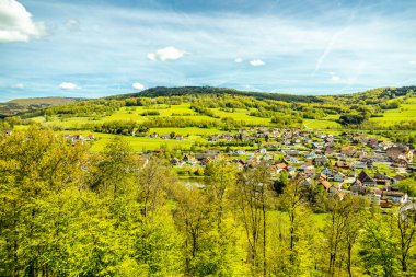 A springtime hike through the beautiful Sinntal valley to the Schwarzen Berge near Riedenberg - Bavaria -Germany clipart