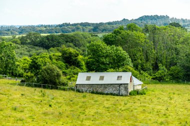 Travelling through the beautiful Dorset countryside to Corfe Castle and the Swanage Railway - United Kingdom clipart