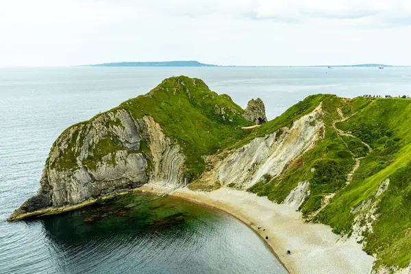 stock image Travelling on the South West Coast Path between Lulworth Cove and Durdle Door near Lulworth - United Kingdom