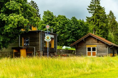 A short walk on the edge of the Thuringian Forest to Hallenburg Castle from the Knllfeld ski area - Steinbach-Hallenberg - Thuringia - Germany clipart