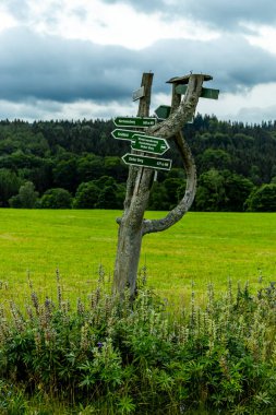 A short walk on the edge of the Thuringian Forest to Hallenburg Castle from the Knllfeld ski area - Steinbach-Hallenberg - Thuringia - Germany clipart