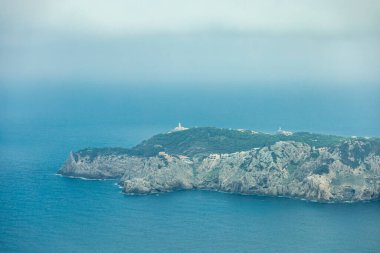 Hike to the Talaia de son Jaumell mountain and viewpoint just outside the town of Cala Rajada - Mallorca - Spain clipart