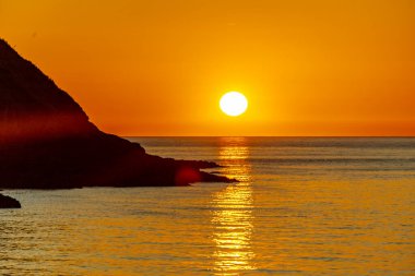 A fantastic sunset on the North Devon coast near Watermouth - United Kingdom clipart