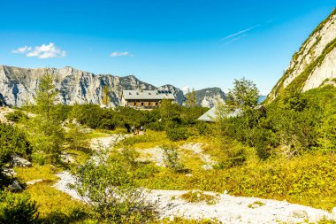 A wonderful late summer hike through the Berchtesgaden Alpine landscape to the Blue Ice Glacier - Berchtesgaden - Bavaria - Germany clipart