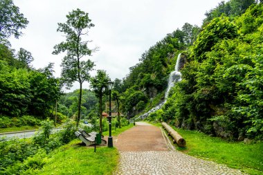 A springtime hike around the tourist attraction in Brotterode-Trusetal - the Trusetal waterfall - Thuringia - Germany clipart