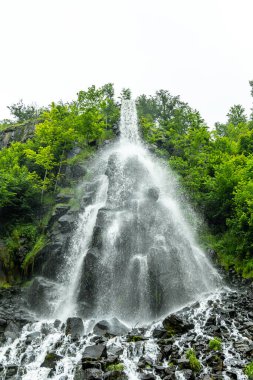 A springtime hike around the tourist attraction in Brotterode-Trusetal - the Trusetal waterfall - Thuringia - Germany clipart