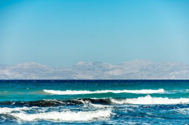 Holiday feeling in the South Aegean on the beautiful Greek sunny island of Kos on the beach of Limnionas and Kohilari - Greece  clipart