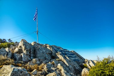 Hike to the highest point of the Greek island of Kos in the South Aegean - Mount Dikeos - Greece  clipart