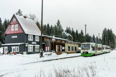 A winter hike to Rennsteig railway station in the snow-covered Thuringian Forest - Schmiedefeld - Thuringia - Germany - 11-2024 clipart