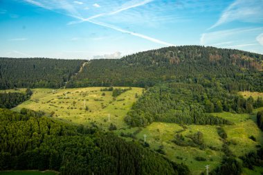 Late summer hike on a beautiful evening to the Haderholzstein viewpoint near Floh-Seligenthal - Thuringian Forest - Thuringia - Germany clipart