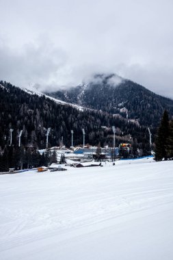 A round of cross-country skiing in the South Tyrolean arena of Antholz in the beautiful Antholz Valley - South Tyrol - Italy clipart