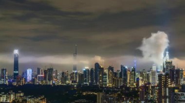 Time-lapse 4k UHD footage of cityscape of Kuala Lumpur, Malaysia during raining monsoon season