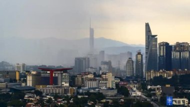 Kuala Lumpur, Malaysia - January 1, 2023 - Time-lapse 4k UHD footage of cityscape of Kuala Lumpur, Malaysia during raining monsoon season 
