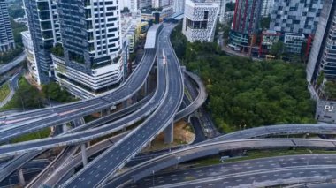 Kuala Lumpur, Malaysia - Dec 3, 2022 - Timelapse footage of Dash Highway ( Damansara Shah Alam Elevated Highway) Multilevel highway structure The Most Complicated Interchange in Southeast Asia