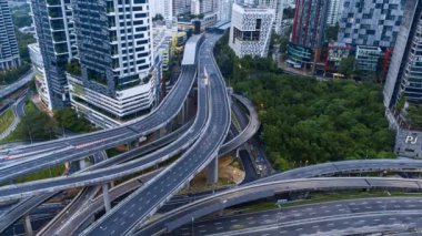 Kuala Lumpur, Malaysia - Dec 3, 2022 - Timelapse footage of Dash Highway ( Damansara Shah Alam Elevated Highway) Multilevel highway structure The Most Complicated Interchange in Southeast Asia
