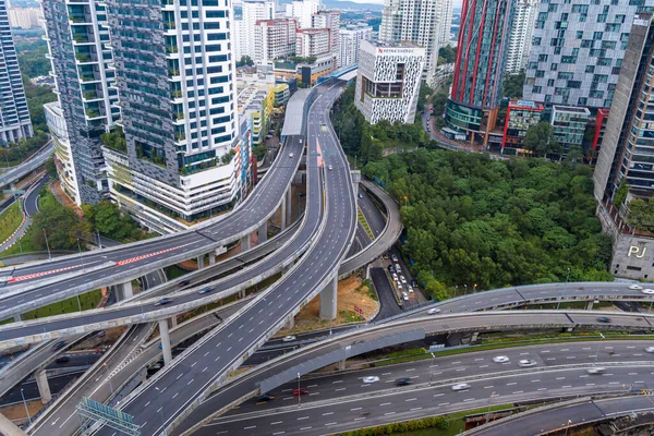 Kuala Lumpur, Malaysia - Dec 3, 2022 - Timelapse footage of Dash Highway ( Damansara Shah Alam Elevated Highway) Multilevel highway structure The Most Complicated Interchange in Southeast Asia