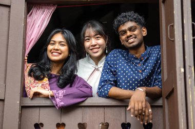 Group of Malaysian student wearing traditional cloth for festival celebration clipart