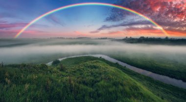 Landscape with a Rainbow on the River in Spring. colorful morning. nature of Ukraine