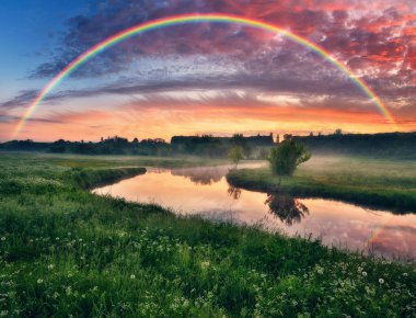 Landscape with a Rainbow on the River in Spring. colorful morning. nature of Ukraine