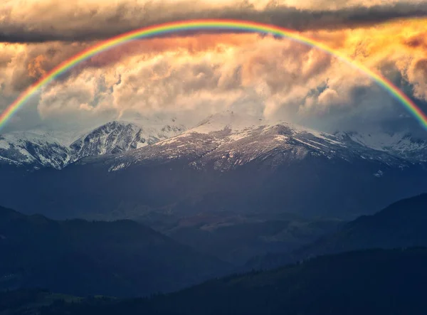 Rainbow over the Mountains. autumn morning in the Carpathians. Nature of Ukraine