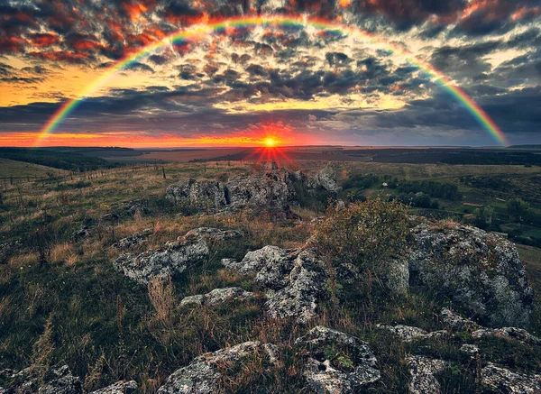 Rainbow with clouds over the canyon. autumn landscape. nature of Ukraine