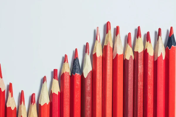 Stock image graph of growth in the form of pencils with a red lead - horizontal photo