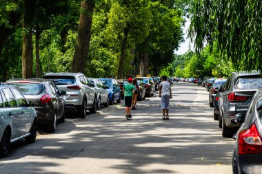 People and tourists wander the streets of the Bucharest Old Town, Romania, 2022