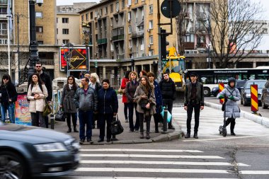 People and tourists wander the streets of the Bucharest Old Town, Romania, 2022