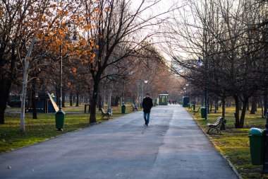 People and tourists wander the streets of the Bucharest Old Town, Romania, 2022