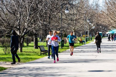 Beautiful city park and people having fun in Bucharest, Romania, 2023